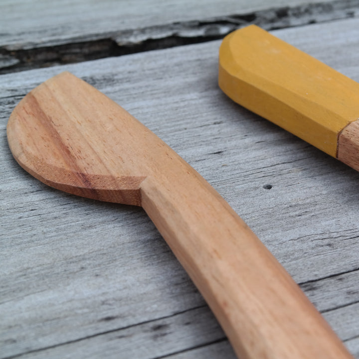 Hand carved honey spreader (British acacia)