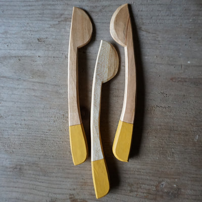 Hand carved cherry spreader