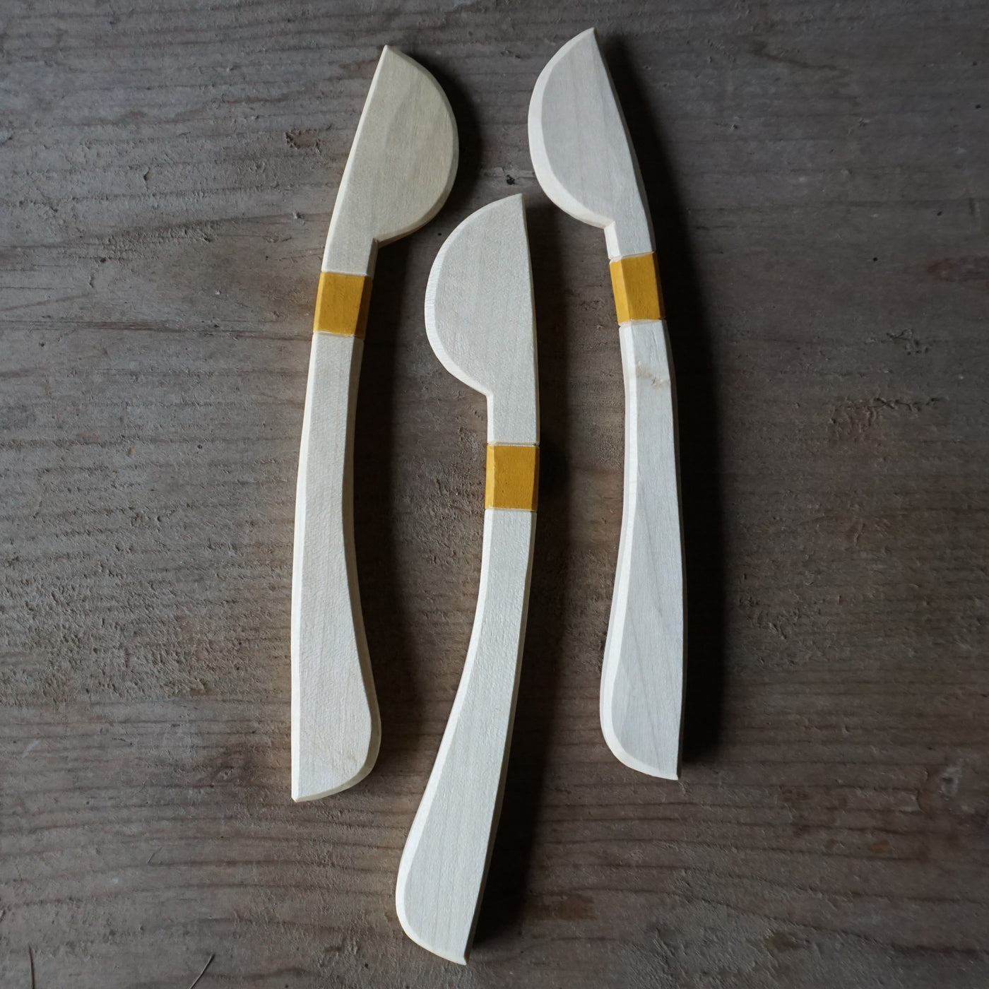 Hand carved sycamore spreader