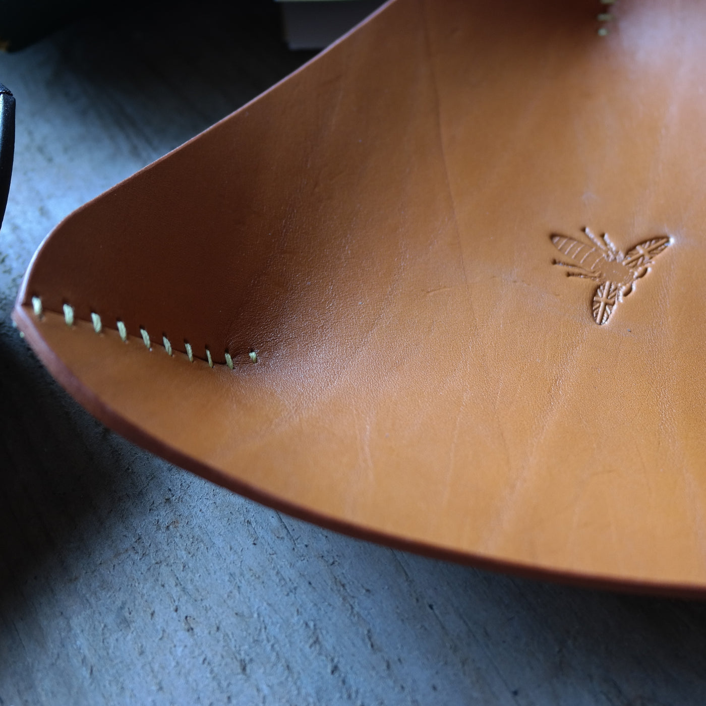Limited edition leather coin tray in light tan