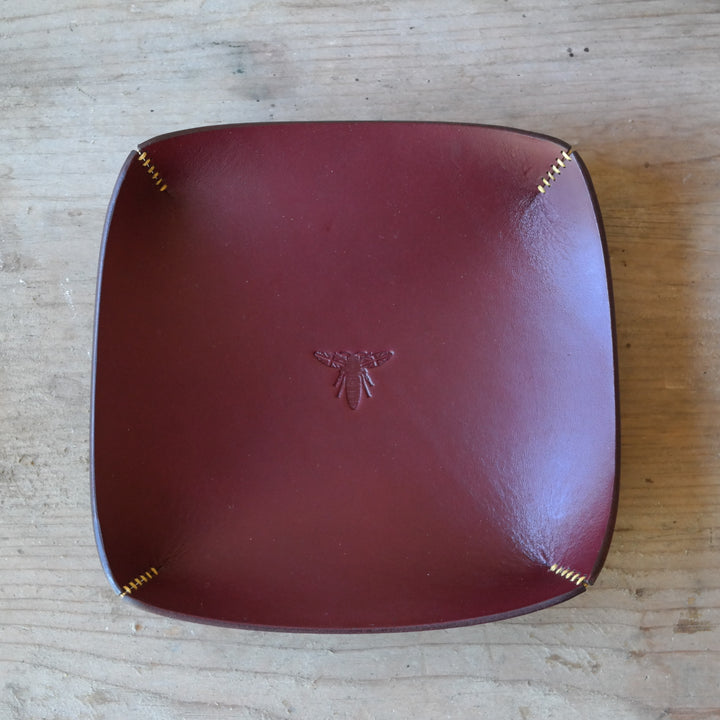 Square leather coin tray in deep plum British leather