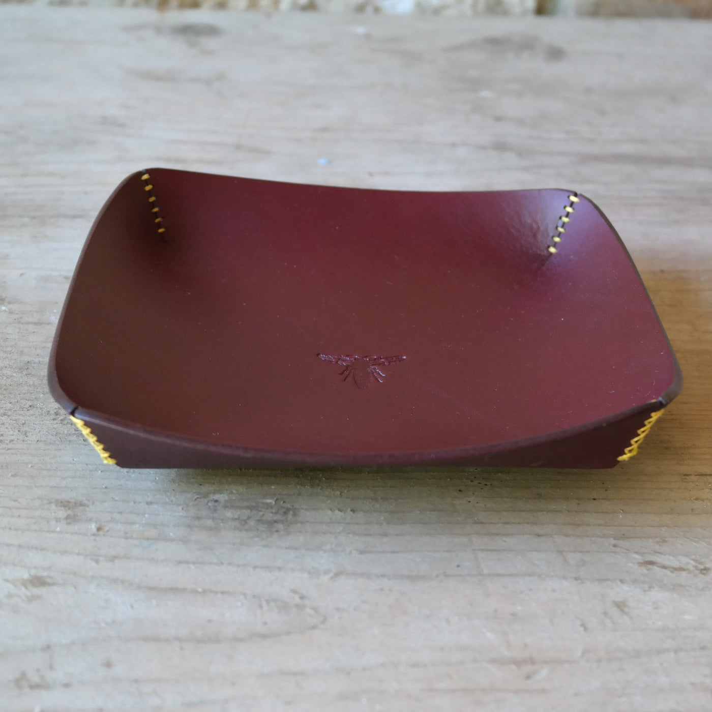Square leather coin tray in deep plum British leather
