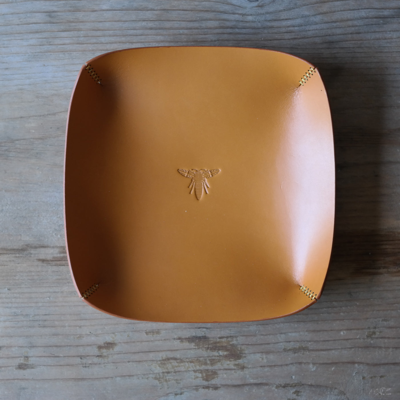 Square leather coin tray in light tan British leather
