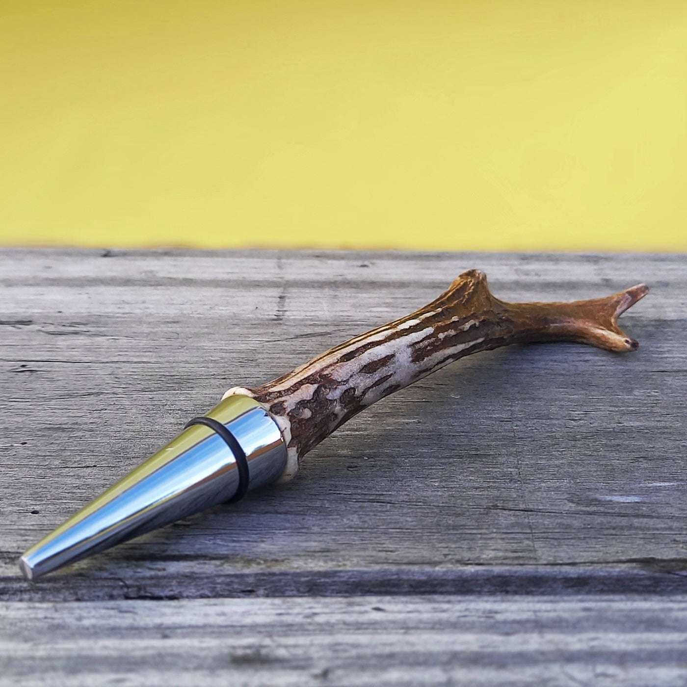 Bottle stopper made from a roe deer antler